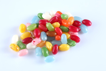 group of colored candies isolated on white background