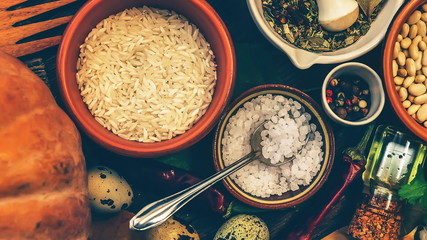 products for cooking, vegetables, ingredients, spices. wooden background