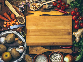 products for cooking, vegetables, ingredients, spices. place for text. wooden plank. food background.