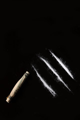 set of cocaine on black background