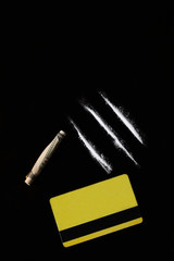 set of cocaine on black background