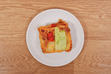 Lasagna with vegetables on a table