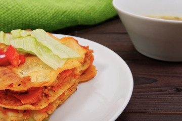 Lasagna with vegetables on a table