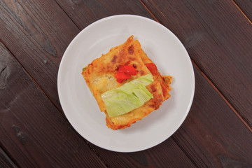 Lasagna with vegetables on a table