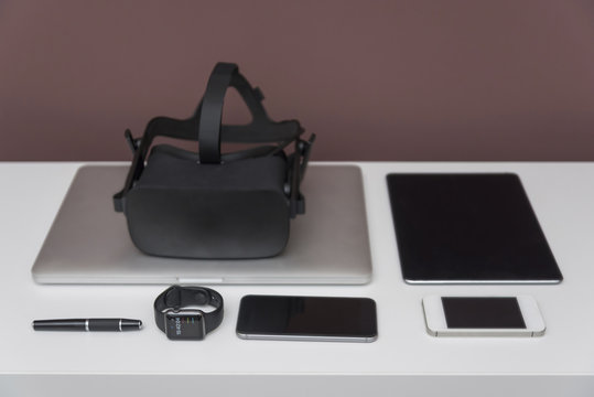 Wearables and mobile devices on dresser