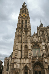Fototapeta na wymiar Bell tower and gothic facade of the Cathedral of Our Lady in Antwerp. Port and multicultural metropolis, it is known as one of the main European gateways for goods in Europe. Northern Belgium.