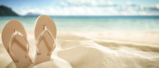 flip flops on beach and summer time  - Powered by Adobe
