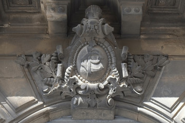 Coat of arms on the building in the center of Narbonne, France