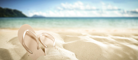 flip flops on beach and summer time  - obrazy, fototapety, plakaty