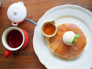 pancakes in honey syrup and ice cream.   .