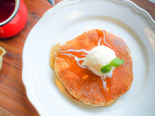 pancakes in honey syrup and ice cream.   .