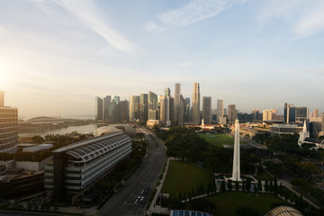 Naklejka na ściany i meble Panorama of Singapore business district skyline and skyscraper with War Memorial Park in morning at Marina Bay, Singapore. Asia