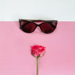 Fashionable stylish accessories for women on a pink white background. The minimum. Flat lay