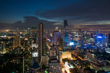Fototapeta na wymiar Modern building in Bangkok business district at Bangkok city with skyline in night, Thailand.