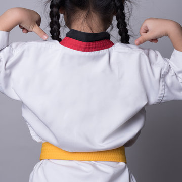 The Karate Girl With Yellow Belt