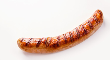 Fototapeta Single German bratwurst sausage on white obraz
