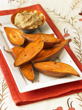 Roasted Sweet Potatoes with Cinnamon Butter
