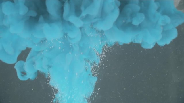 Blue ink explosion in water
