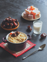 Oatmeal with milk and dates. Healthy natural food. Ramadan menu