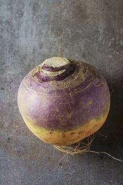Ripe purple turnips with green leaves