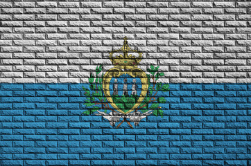 San Marino flag is painted onto an old brick wall