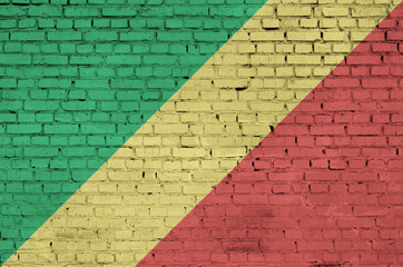 Congo flag is painted onto an old brick wall