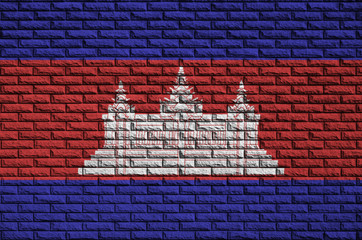 Cambodia flag is painted onto an old brick wall