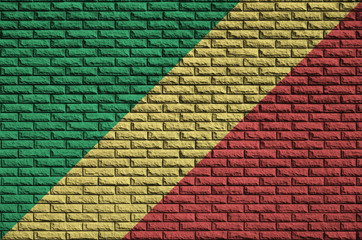 Congo flag is painted onto an old brick wall