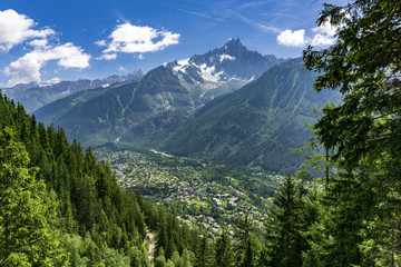 Fototapeta na wymiar A beautiful view of the Chamonix valley between the mountains. Alps.