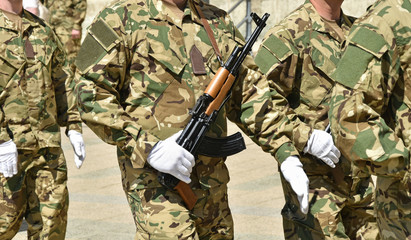 Fototapeta premium Soldiers are marching at the military parade.