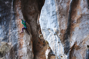 A rock climber on a rock.