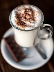 Chocolate milk coffe cappuccino beverage foam cream cup glass special breakfast table food bar launch brown hot
