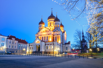 Fototapeta na wymiar Russian Orthodox Alexander Nevsky Cathedral and Christmass illuminated at night, Tallinn, Estonia