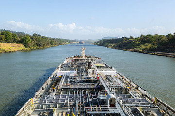 Oil product tanker is proceeding throught the Panama Canal.