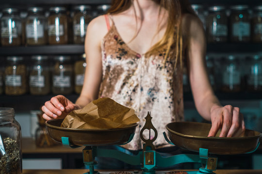 Vintage scales with paper bag in one bowl