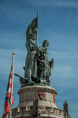 The statues of Jan Breydel and Pieter de Coninck at the Market Square of Bruges. With many canals and old buildings, this graceful town is a World Heritage Site of Unesco. Northwestern Belgium.