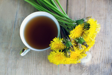 Cup of healthy dandelion tea. Herbal medicine. 