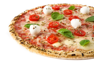 Pizza with tomatoes, cheese and basil isolated on white background


