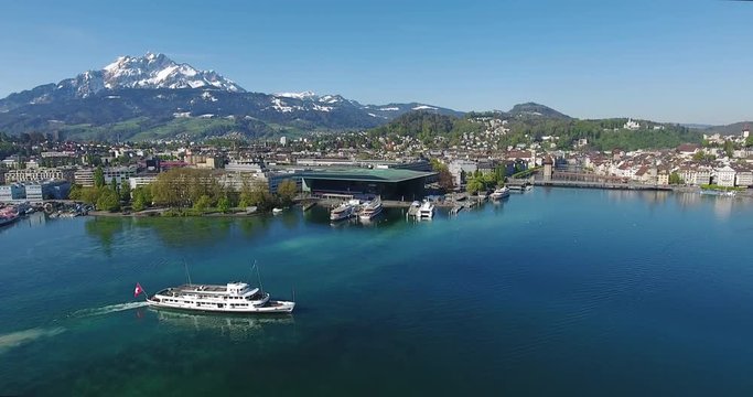 Aerial of Lake Lucerne with Mount Pilatus in the background and a ship leaving