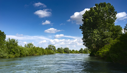 navigation on the Oglio River in the Po Valley,in Italy