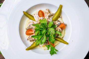 Stroganoff on white plate