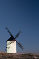 Fototapeta na wymiar Windmills, Wind energy, Nocturnal Campo de Criptana, Ciudad Real, Spain