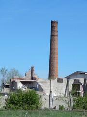 Brick factory chimney. Abandoned enterprise. The old boiler plant.