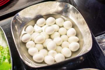 Boiled Quail eggs in salad bar.