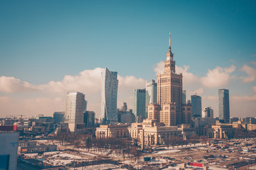 View of the Palace of Culture and Science and the business center of the city on a frosty winter morning from the window of the Novotel Hotel