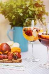 Top view of summer dinks, fruit cocktails on white wood table wi