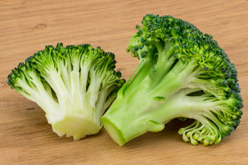 Fresh broccoli on the cutting wooden board