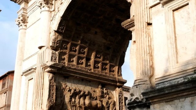 tracking shot on details of the triumphal arch of Tito, in the center of Rome