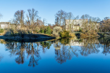 Fototapeta na wymiar Landscape in park with reflections