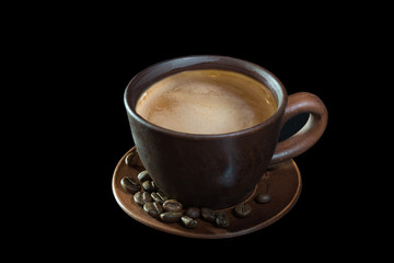 Cup of coffee on the black isolated background
